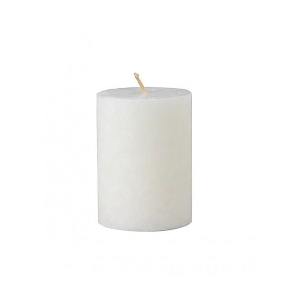 Small white pillar candle